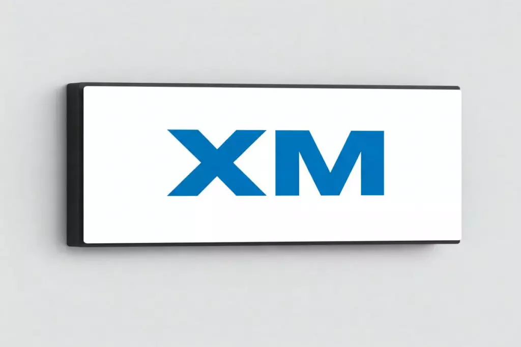شعار منصة XM لتداول عقود العملات الرقمية